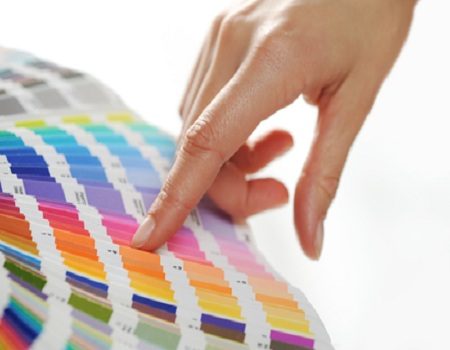 woman Choosing color from color scale